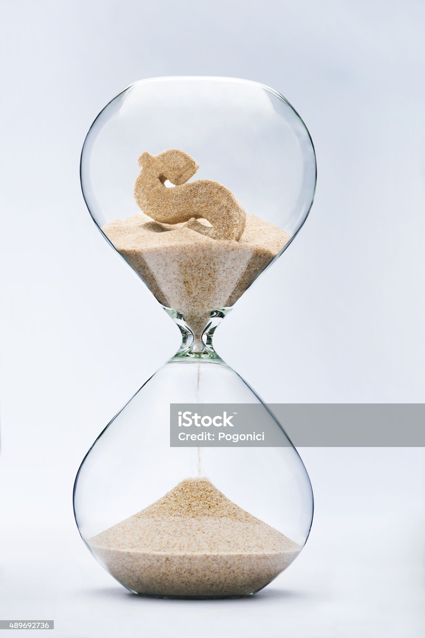 Time is money. Dollar sign flowing down in the hourglass.